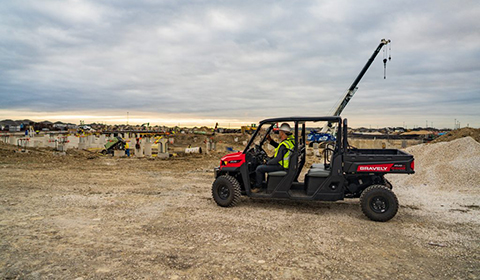 Showing Gravely Atlas JSV UTV being used at construction site