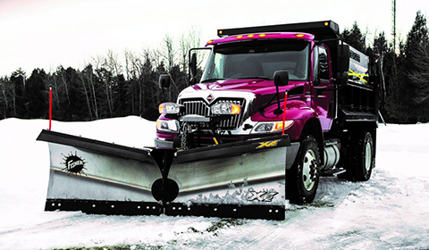 Western snowplows v-plow on pickup truck plowing snow Abco Truck Equipment Toledo Ohio and Michigan